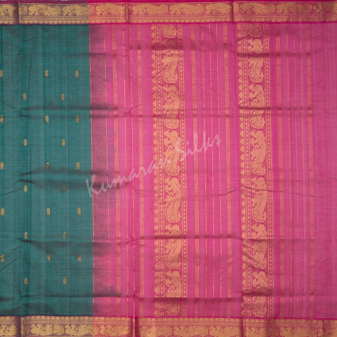 Amirthavarshni Peacock Green Silk Cotton Saree With Pink Border