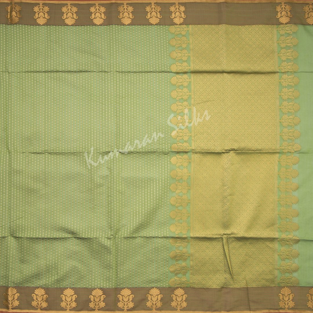 Silk Cotton Embossed Parrot Green Saree