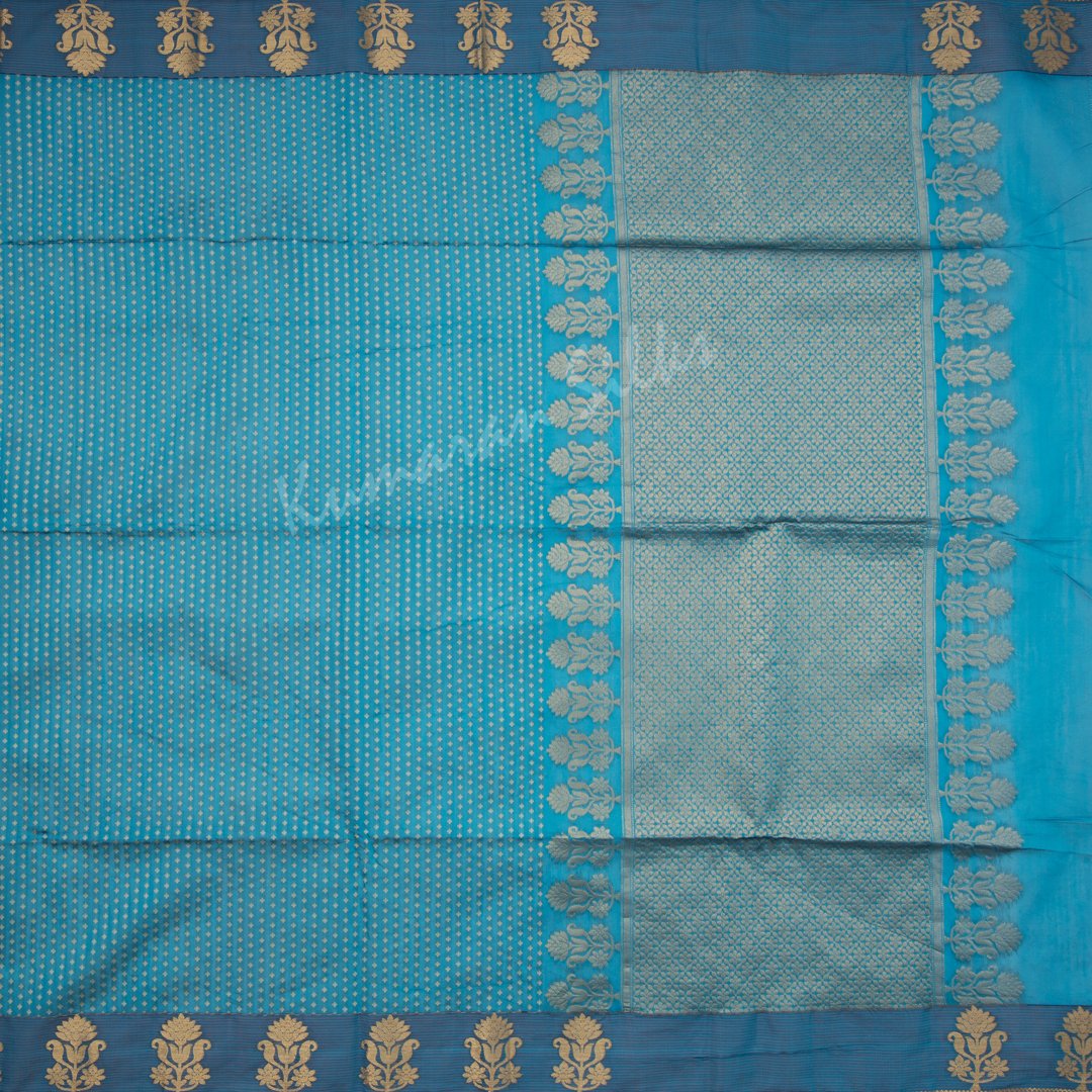 Silk Cotton Embossed Teal Blue Saree 02
