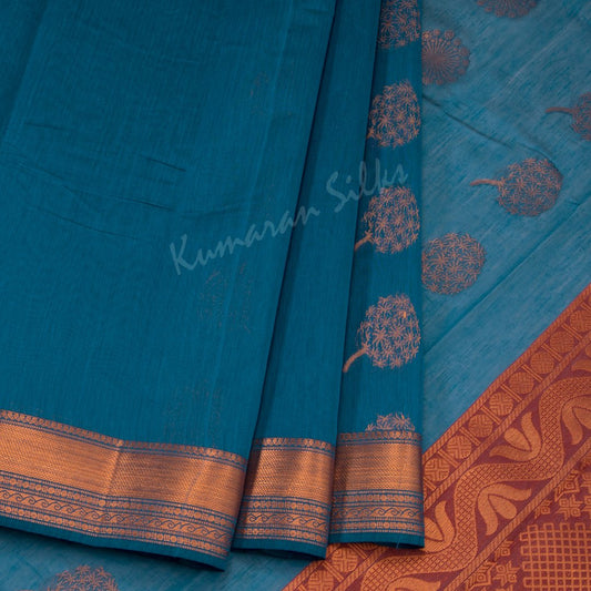 Silk Cotton Peacock Blue Saree With Floral Design On The Body And Zari Border