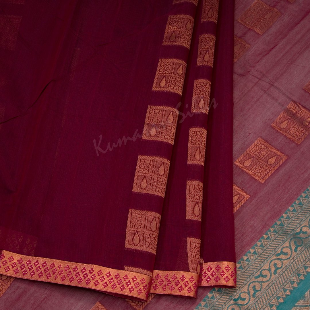 Silk Cotton Maroon Saree With Square Design On The Body And Simple Border