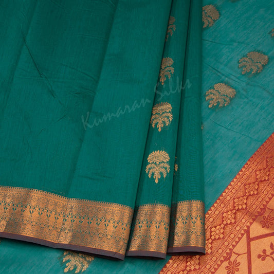 Silk Cotton Peacock Green Saree With Floral Design On The Body And Zari Border