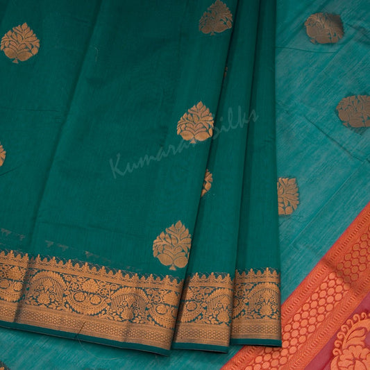 Silk Cotton Peacock Green Saree With Floral Design On The Body And Mango Buttas On The Pallu