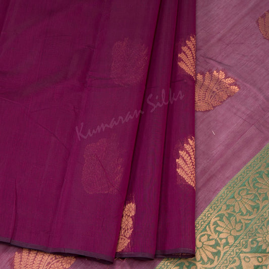 Silk Cotton Purple Borderless Saree With Floral Buttas On The Body And Zig Zag Design On The Pallu