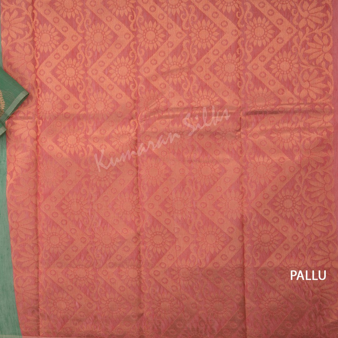 Silk Cotton Light Green Borderless Saree With Floral Buttas On The Body And Zig Zag Design On The Pallu