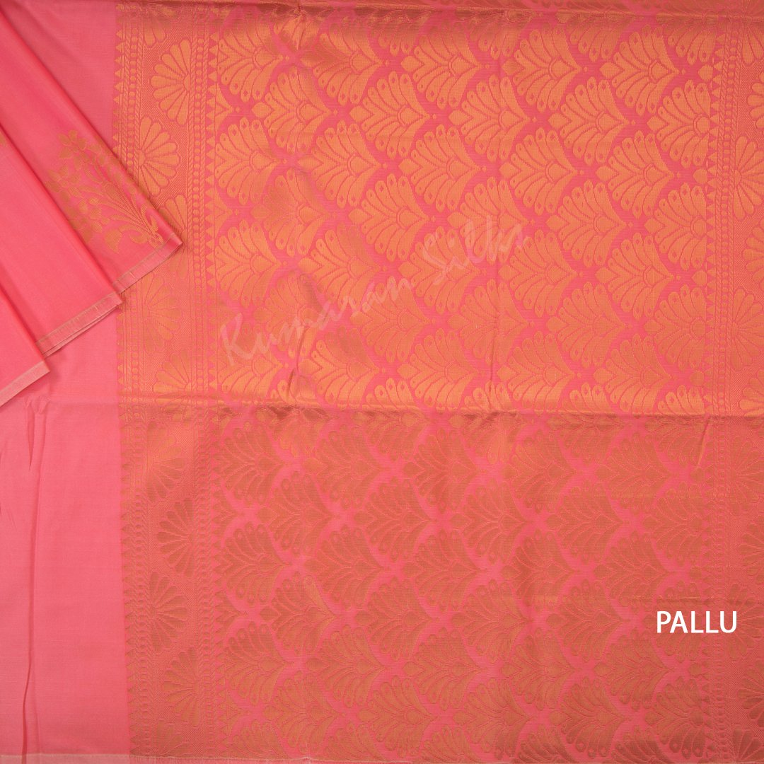 Semi Soft Silk Fiery Rose Pink Borderless Saree With Floral Buttas On The Body And Leaf Design On The Pallu