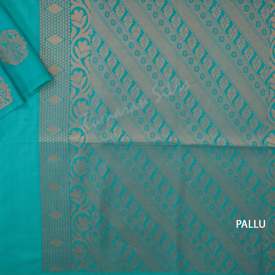 Semi Soft Silk Tiffany Blue Borderless Saree With Floral Buttas On The Body And Multi Design On The Pallu