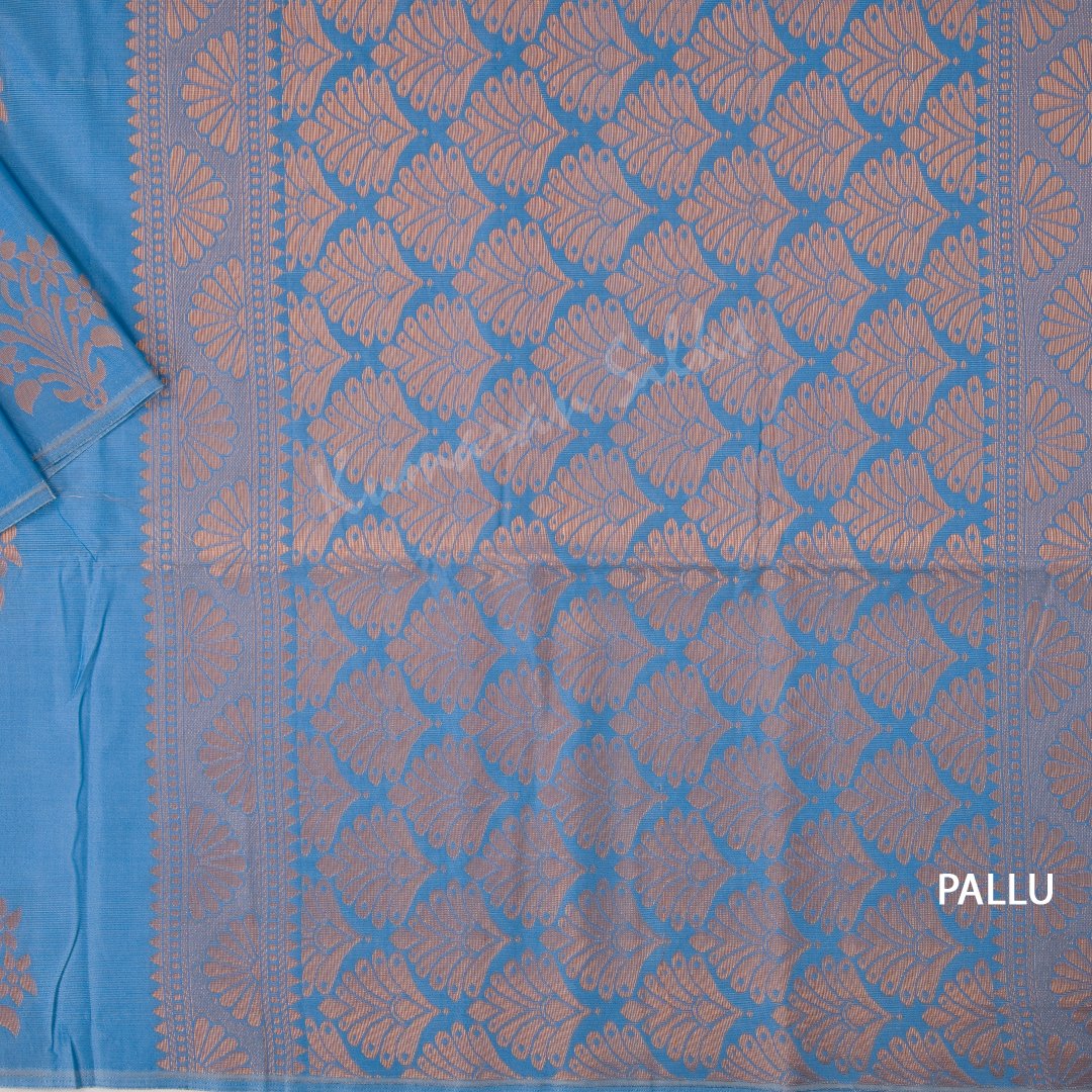 Semi Soft Silk Blue Borderless Saree With Floral Buttas Over The Body