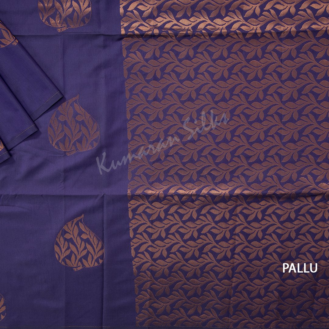 Semi Soft Silk Ink Blue Borderless Saree With Leaf Buttas On The Body And Floral Design On The Pallu