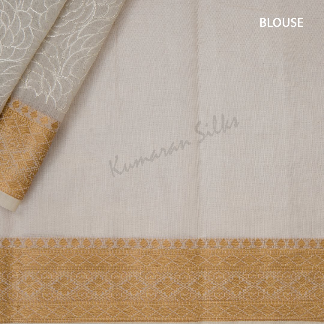 Semi Linen Cream Embroidered Saree With Floral Design On The Body